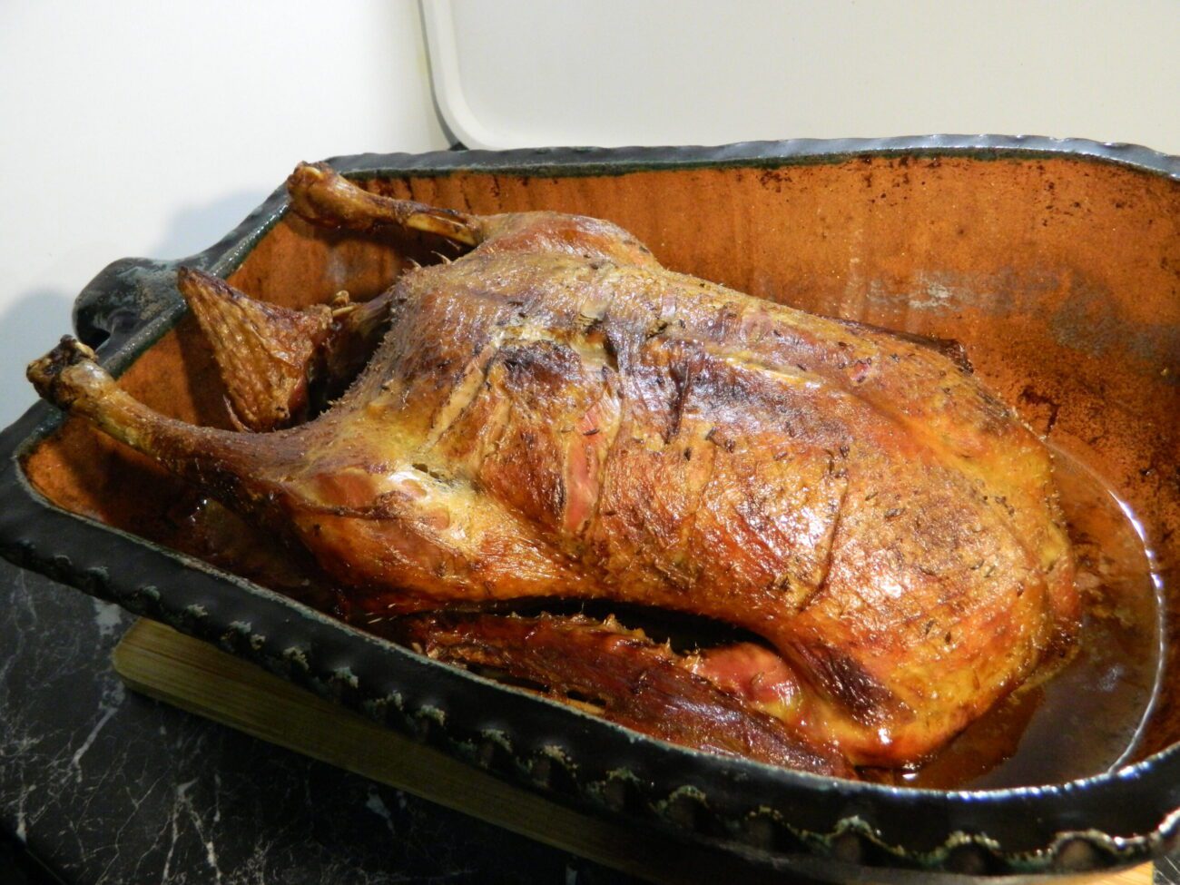 roast goose duck served with cabbage and potato dumplings 2