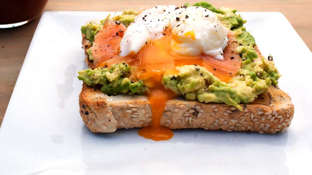 avocado toast salmon and poached egg a breakfast to enjoy