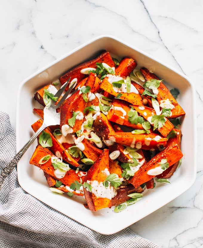 baked sweet potatoes with herbs and yoghurt dip