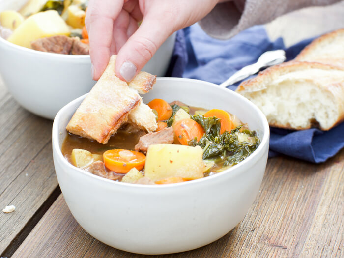 beef soup with rice and kale