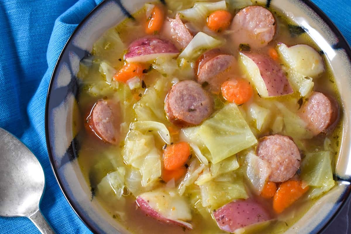 homemade cabbage soup with mushrooms and sausage