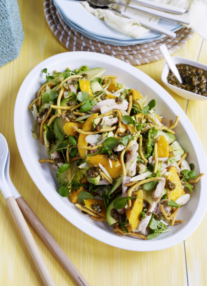 mango chicken salad surrounded by baked noodles recipe