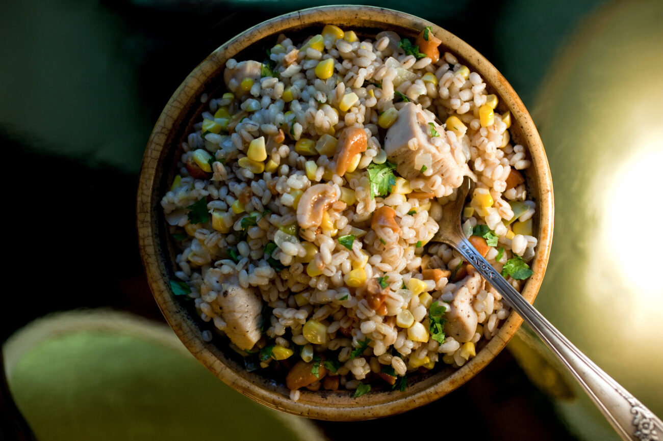 mixed vegetable salad with pilaf and corn