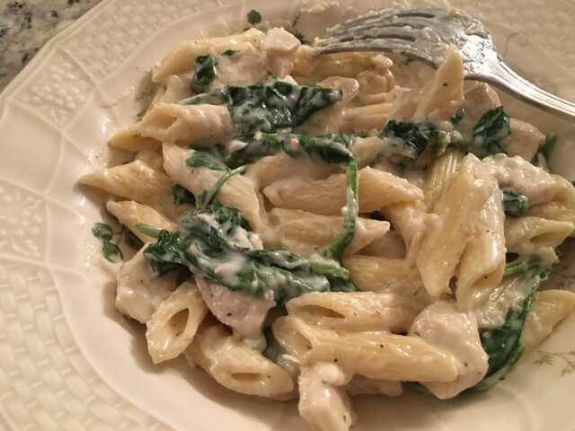 penne and chicken pieces in bechamel sauce