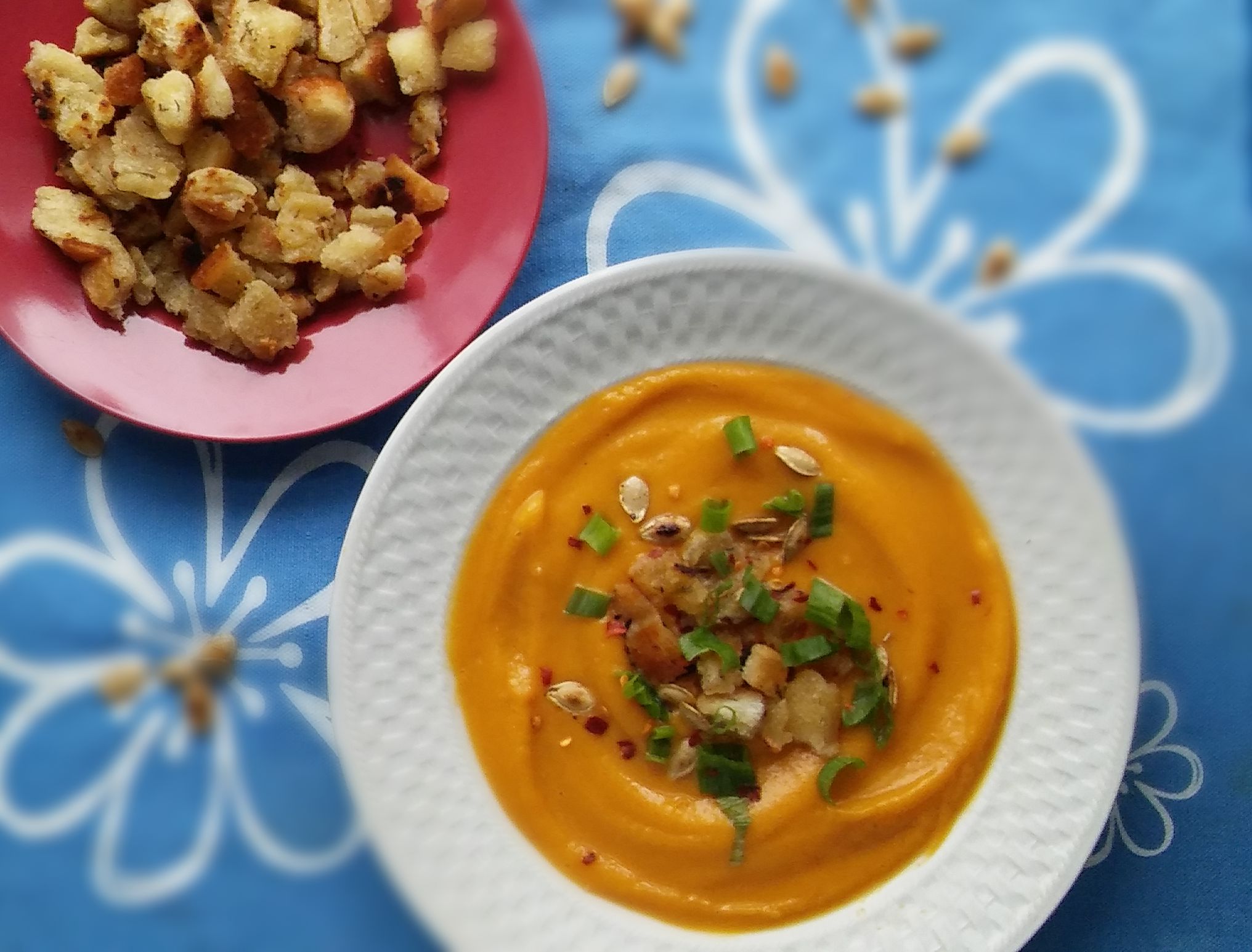 pumpkin soup with toasted pods and flax seeds