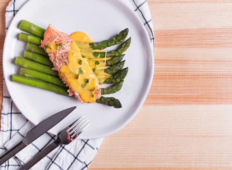 steamed salmon with white asparagus and hollandaise sauce