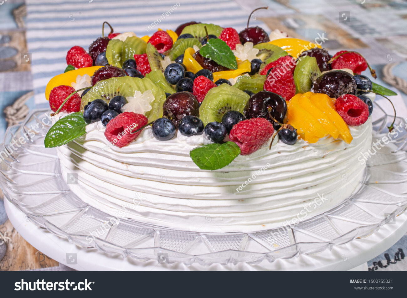 victorian cake with raspberries and whipped cream