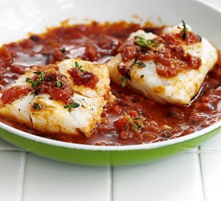 white fish stewed in tomato sauce