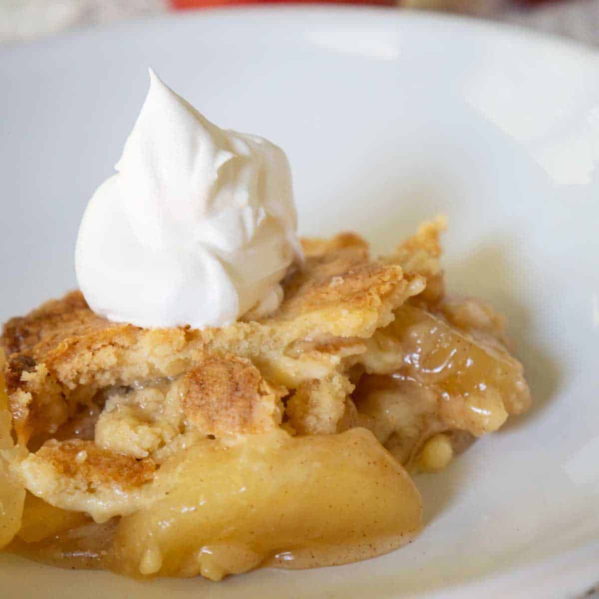 apple and walnut dessert with whipped cream