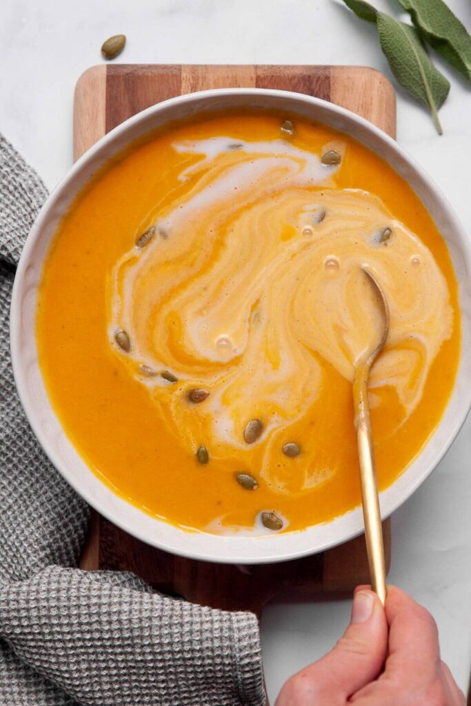 hokkaido pumpkin soup with broccoli and sweet potato