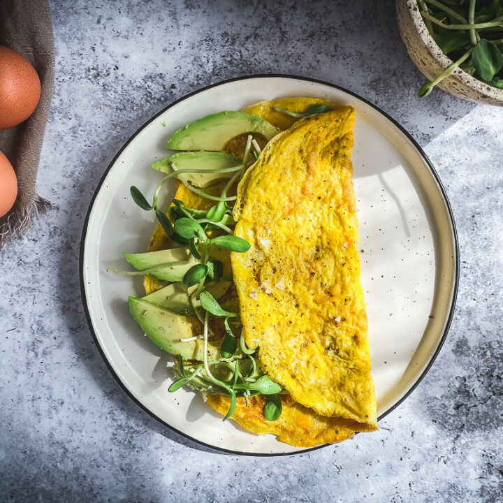 omelette with guacamole and iceberg lettuce