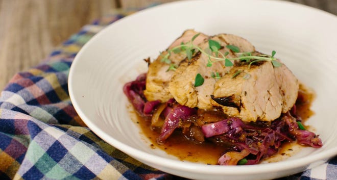 apples stuffed with meat baked in red cabbage