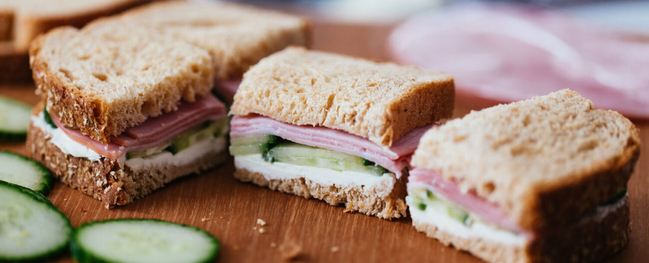 bread with ham lettuce and cucumber or tangerine