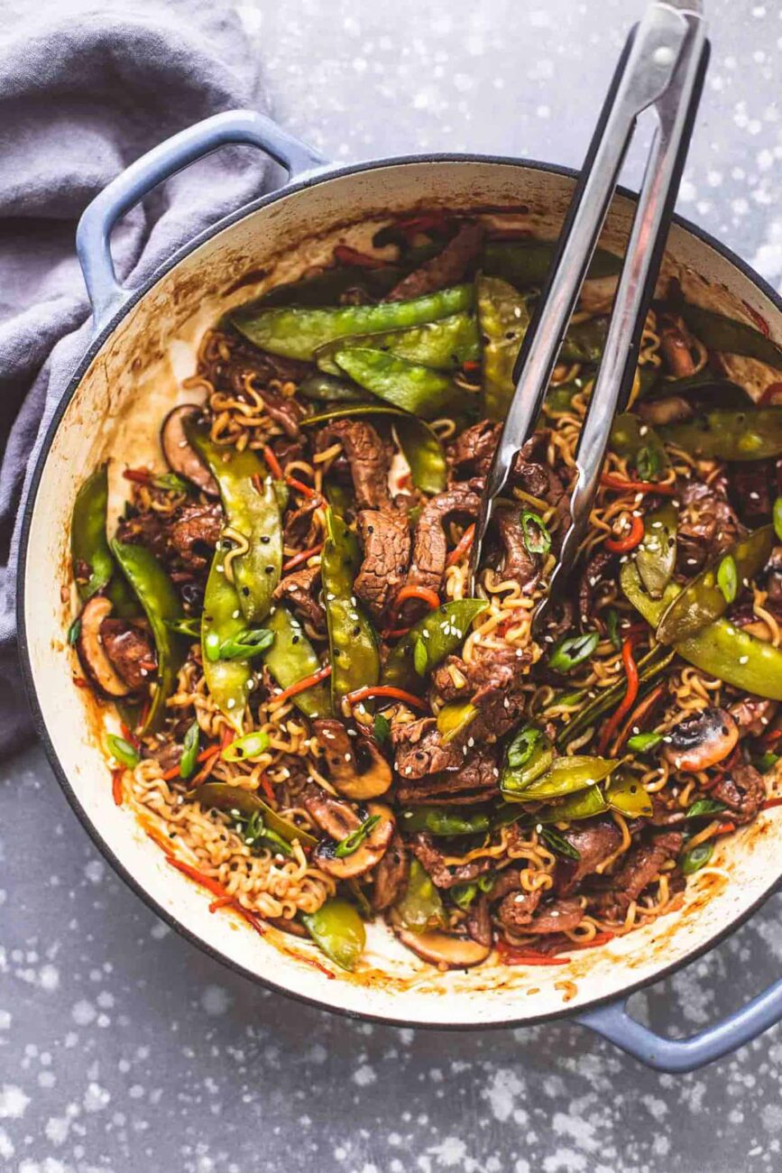 chinese noodles with garlic sprouts and mushrooms