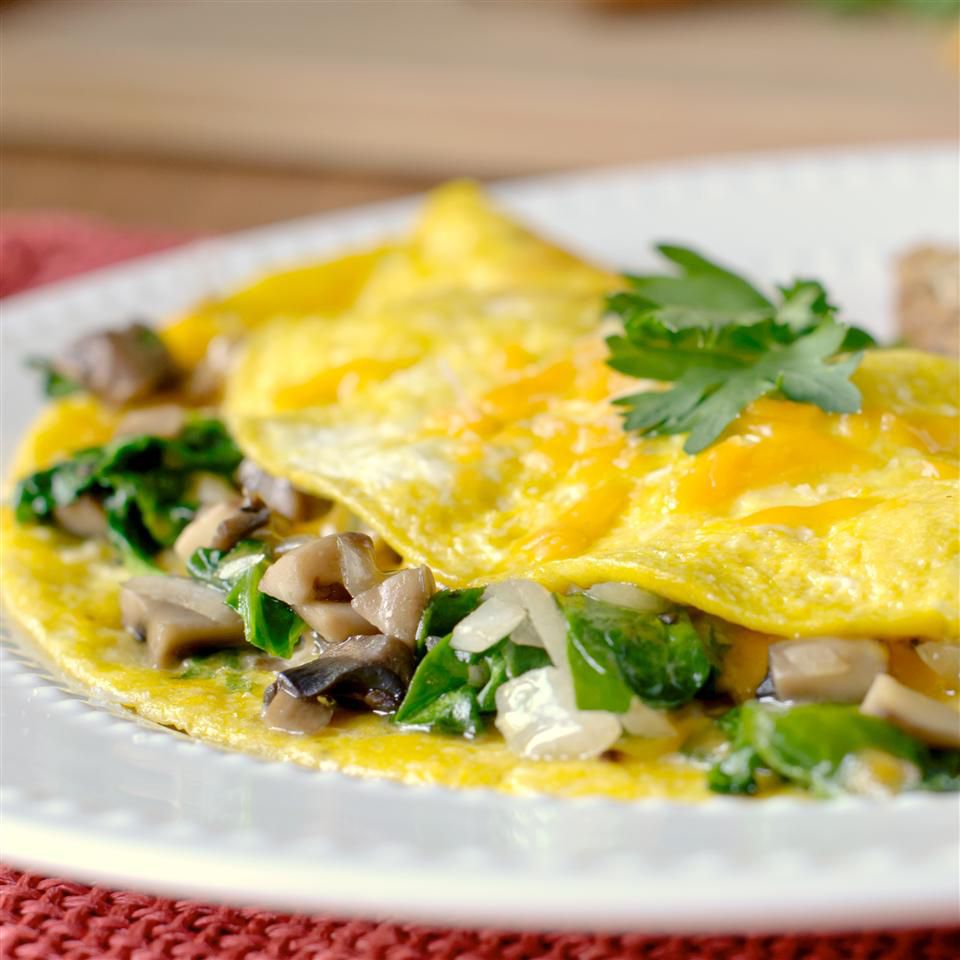 egg omelette with mushrooms and parsley