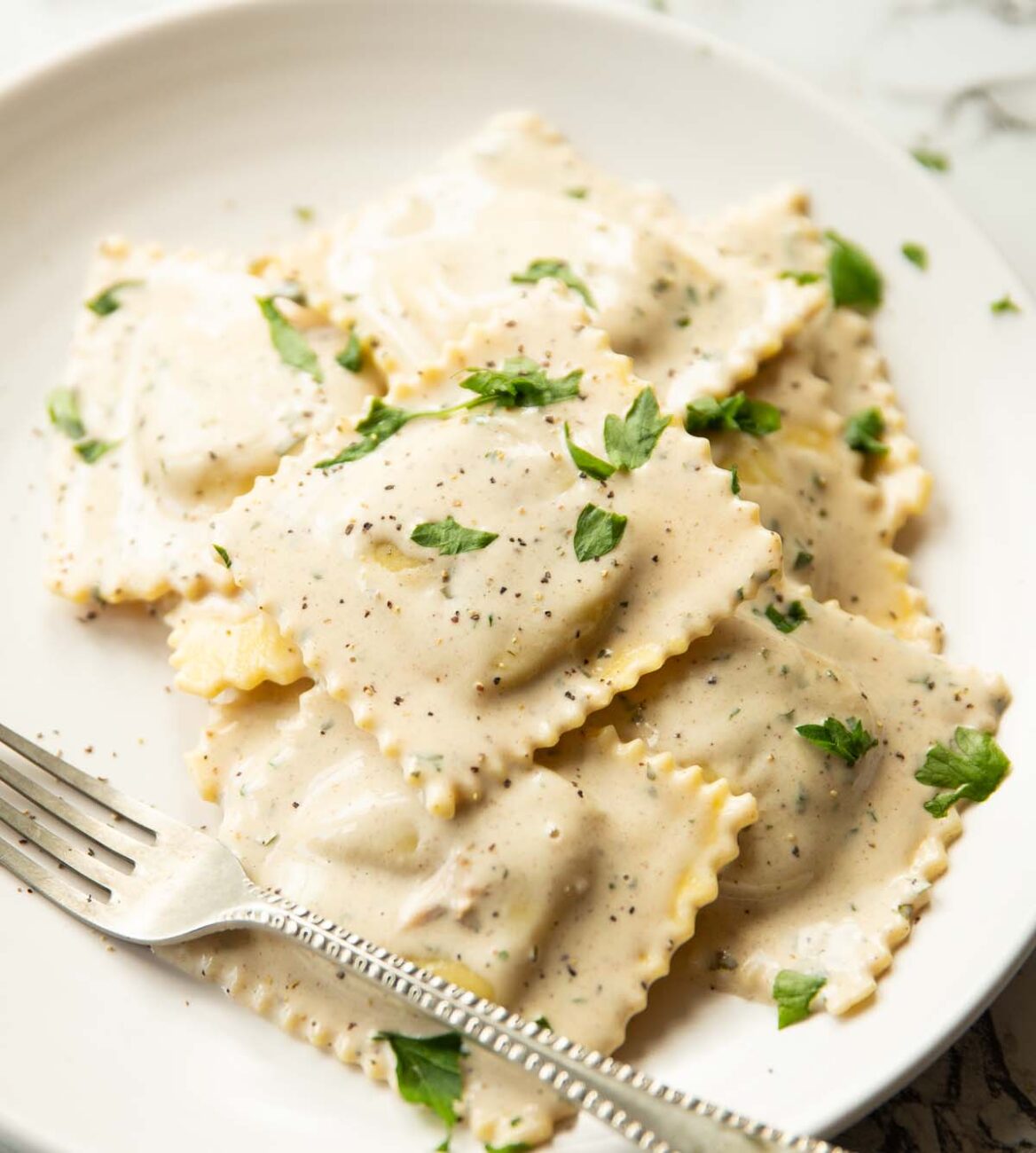 homemade tortellini stuffed with shredded chicken garlic sauce orange dressing