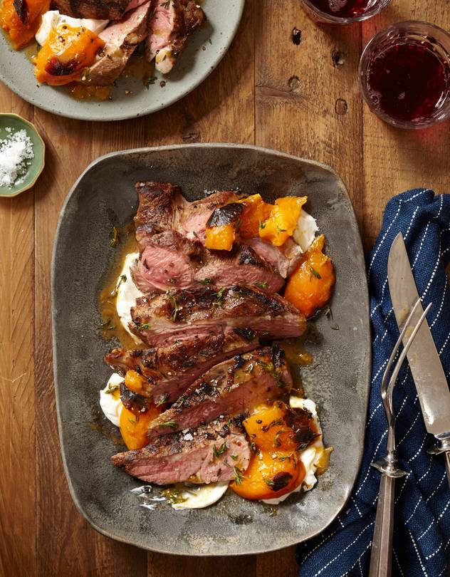 leg of lamb braised in red wine with plums and roasted apricots