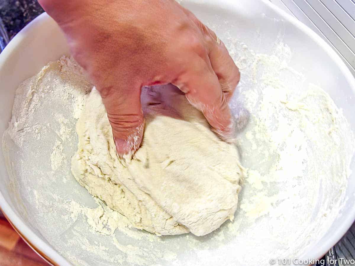 recipe to make pizza dough in a large shallow bowl