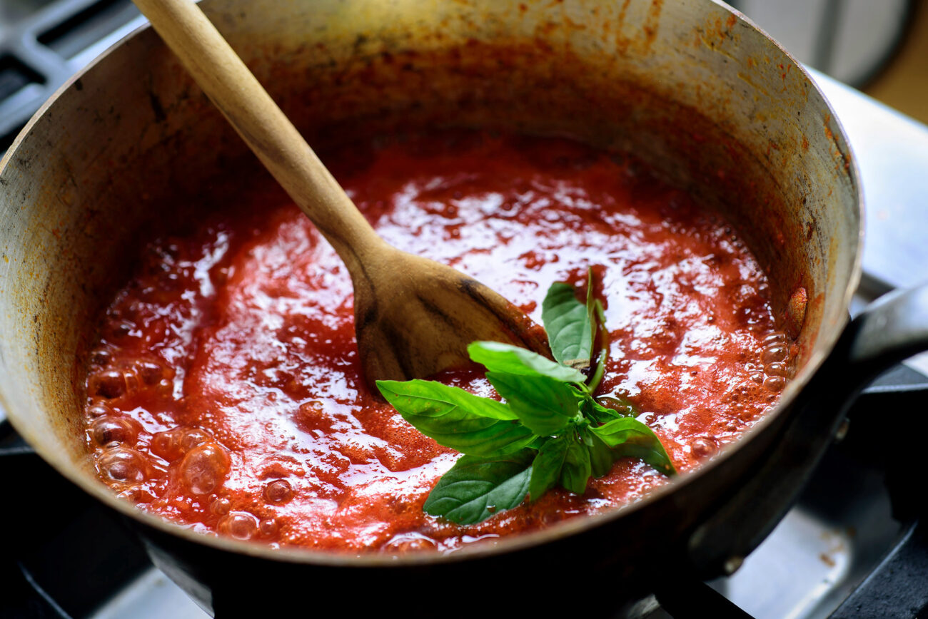 red sauce spaghetti sauce recipe that calls for a whole lemon to simmer the sauce in