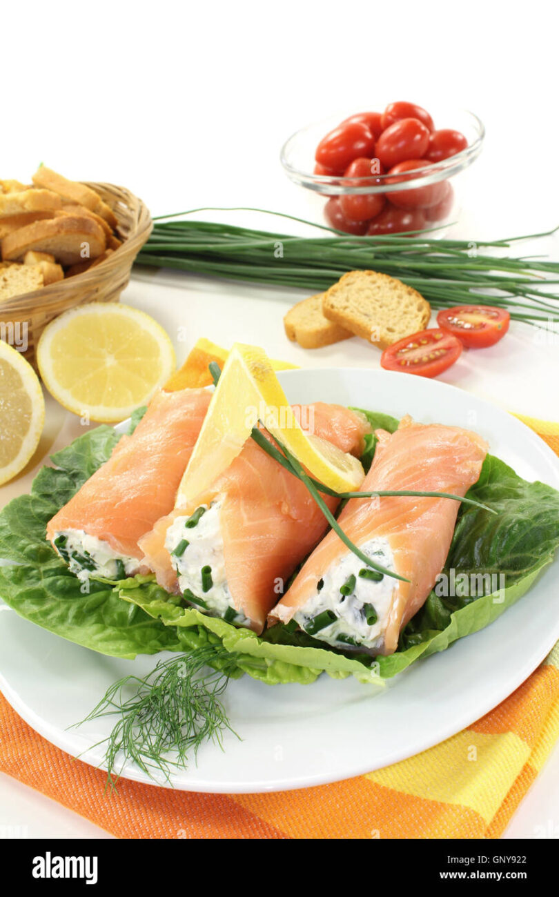 spinach roulade with cheese filling salmon and tomatoes